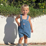 baby girl wearing Wren Soft Sole Boots in Grey