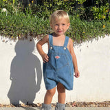 baby girl wearing Wren Soft Sole Boots in Grey
