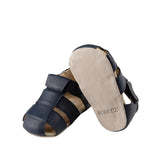 Matthew Sandals in Navy, perspective view -- with one shoe showing the bottom