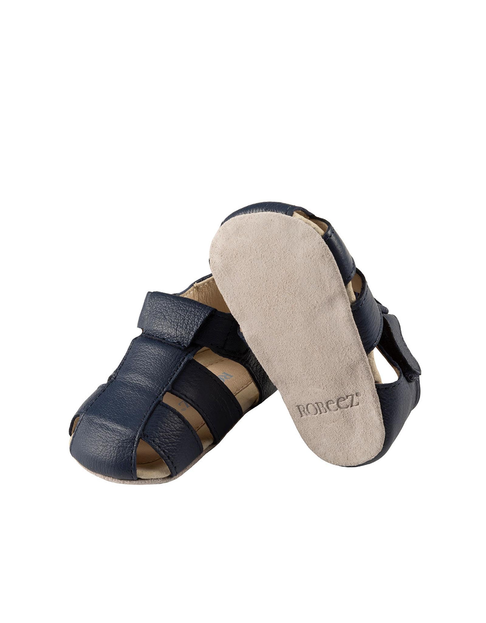 Matthew Sandals in Navy, perspective view -- with one shoe showing the bottom